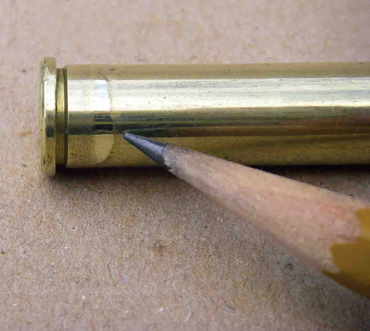 Some lever-action rifles feature a chamber with a bevel to facilitate feeding, which can leave a bulge just forward of the head. This must be removed to assure reliable chambering of handloaded cartridges.